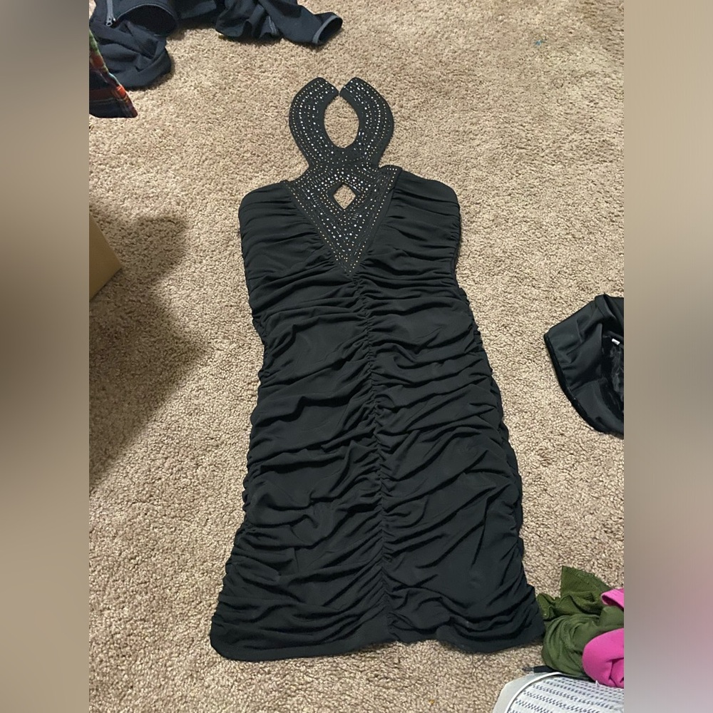 Unsure brand and size, fit me perfectly as a size medium, black dress